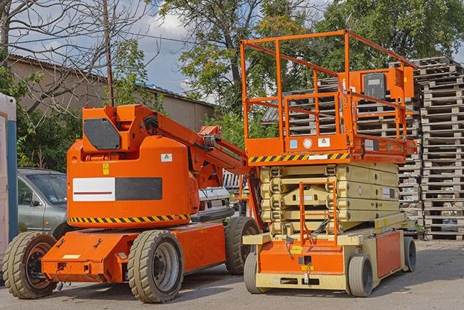 warehouse worker operating a forklift in a shipping yard in Andover MA